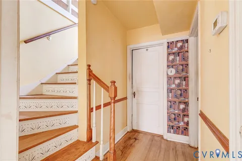 a view of a hallway with staircase