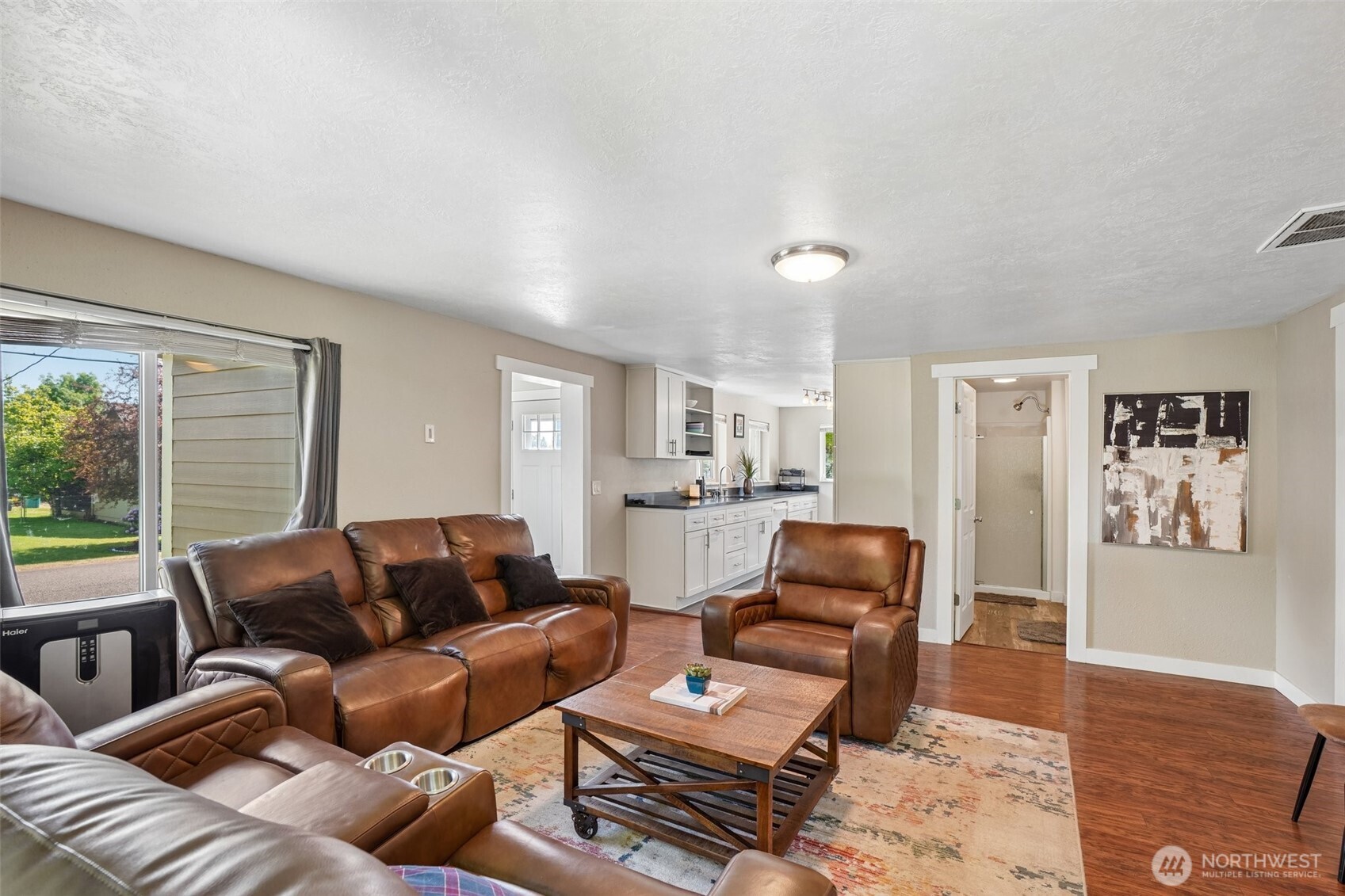 9810 Northeast 3rd Street Vancouver, WA 98664 - Photo 11 of 40 a living room with furniture and wooden floor