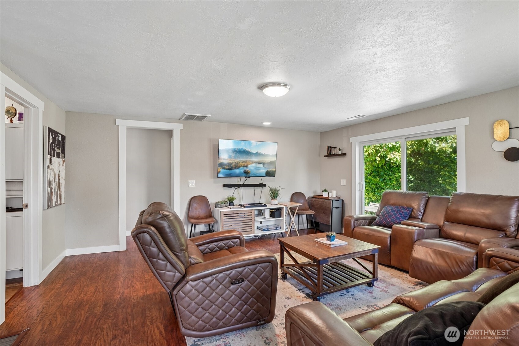 9810 Northeast 3rd Street Vancouver, WA 98664 - Photo 15 of 40 a living room with furniture and a large window