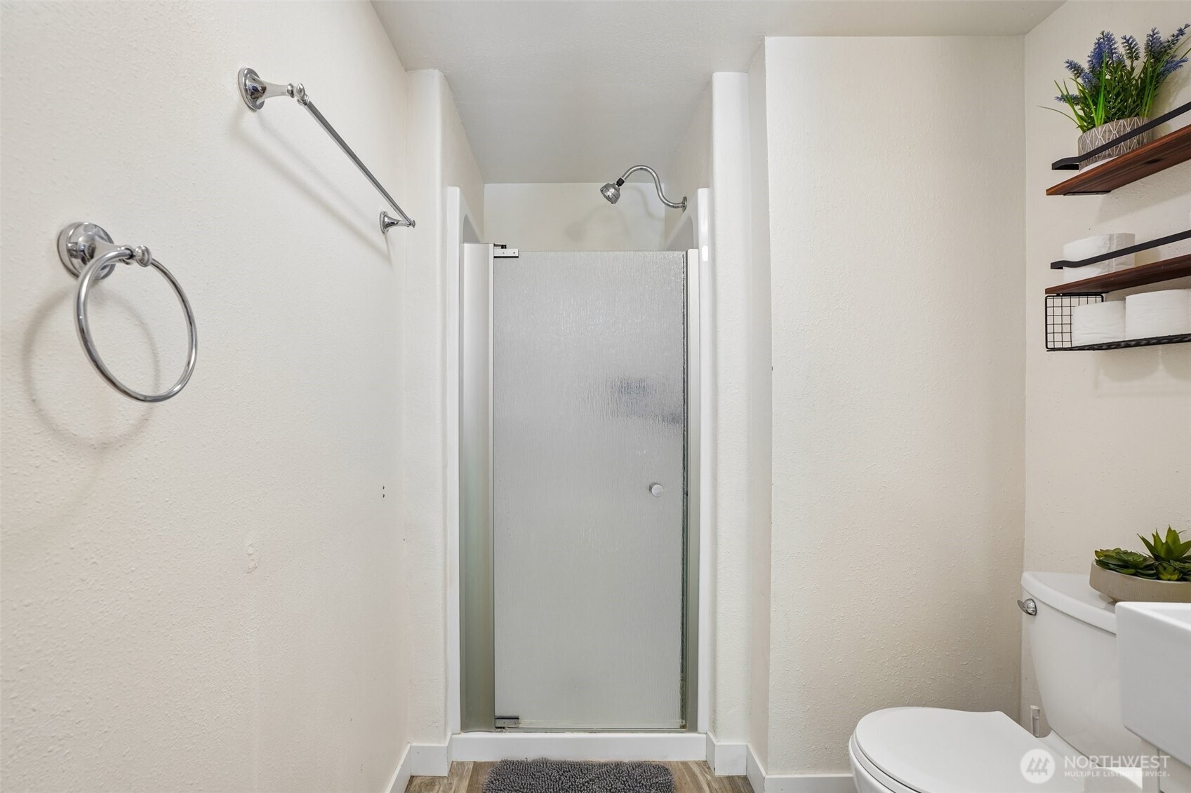 9810 Northeast 3rd Street Vancouver, WA 98664 - Photo 38 of 40 a bathroom with a toilet and a shower