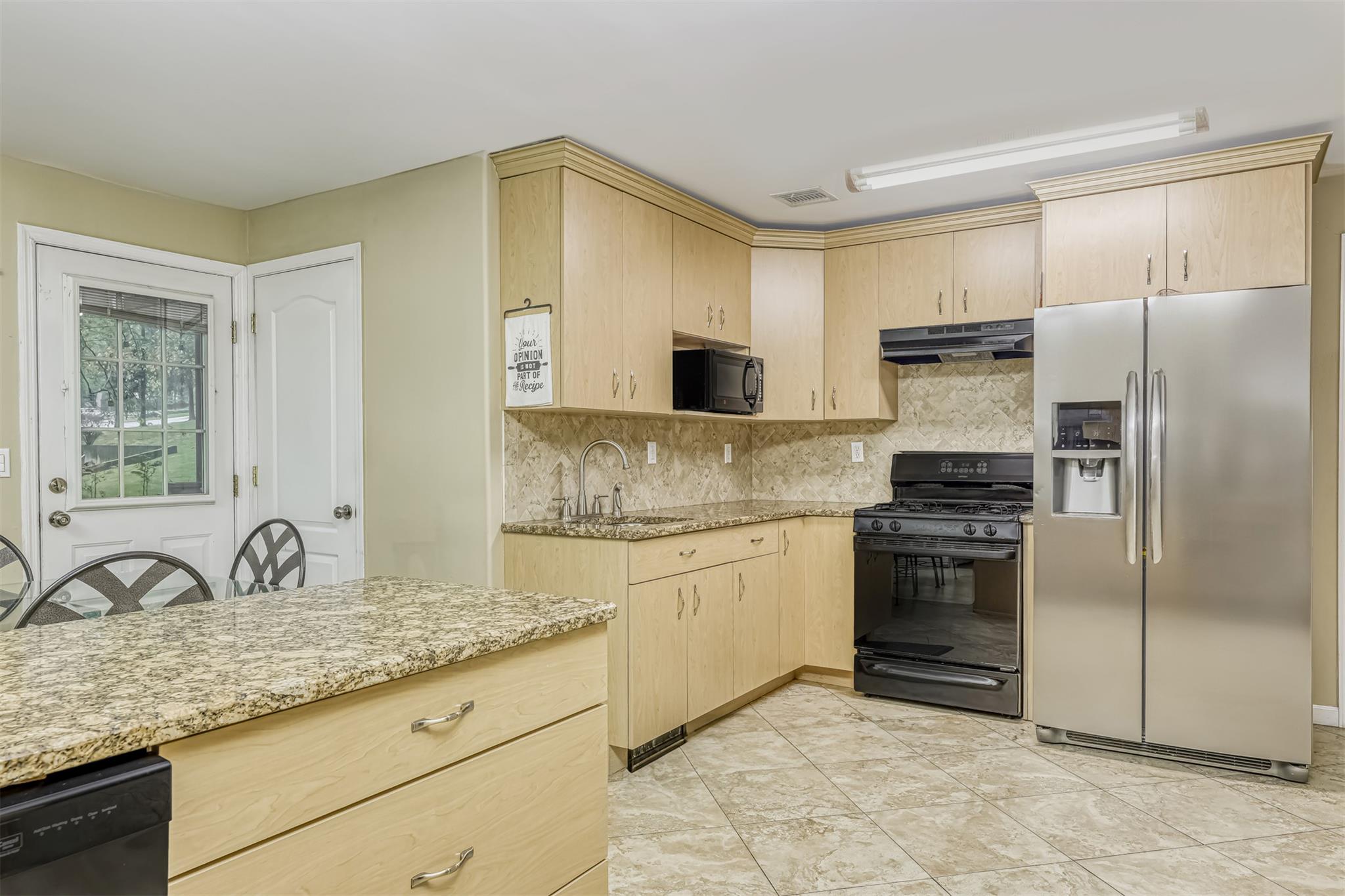 60 Highview Road Monsey, NY 10952 - Photo 12 of 26 a kitchen with granite countertop a sink stove and refrigerator