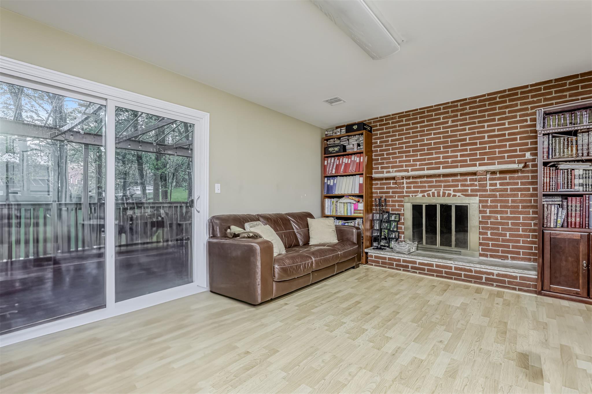 60 Highview Road Monsey, NY 10952 - Photo 13 of 26 a living room with furniture a floor to ceiling window and fireplace