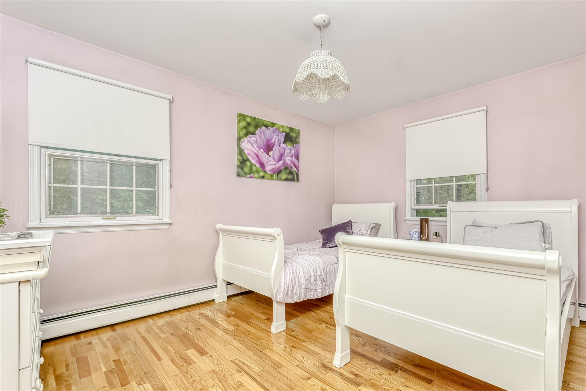 60 Highview Road Monsey, NY 10952 - Photo 17 of 26 a living room with a baby crib furniture a chandelier and a window