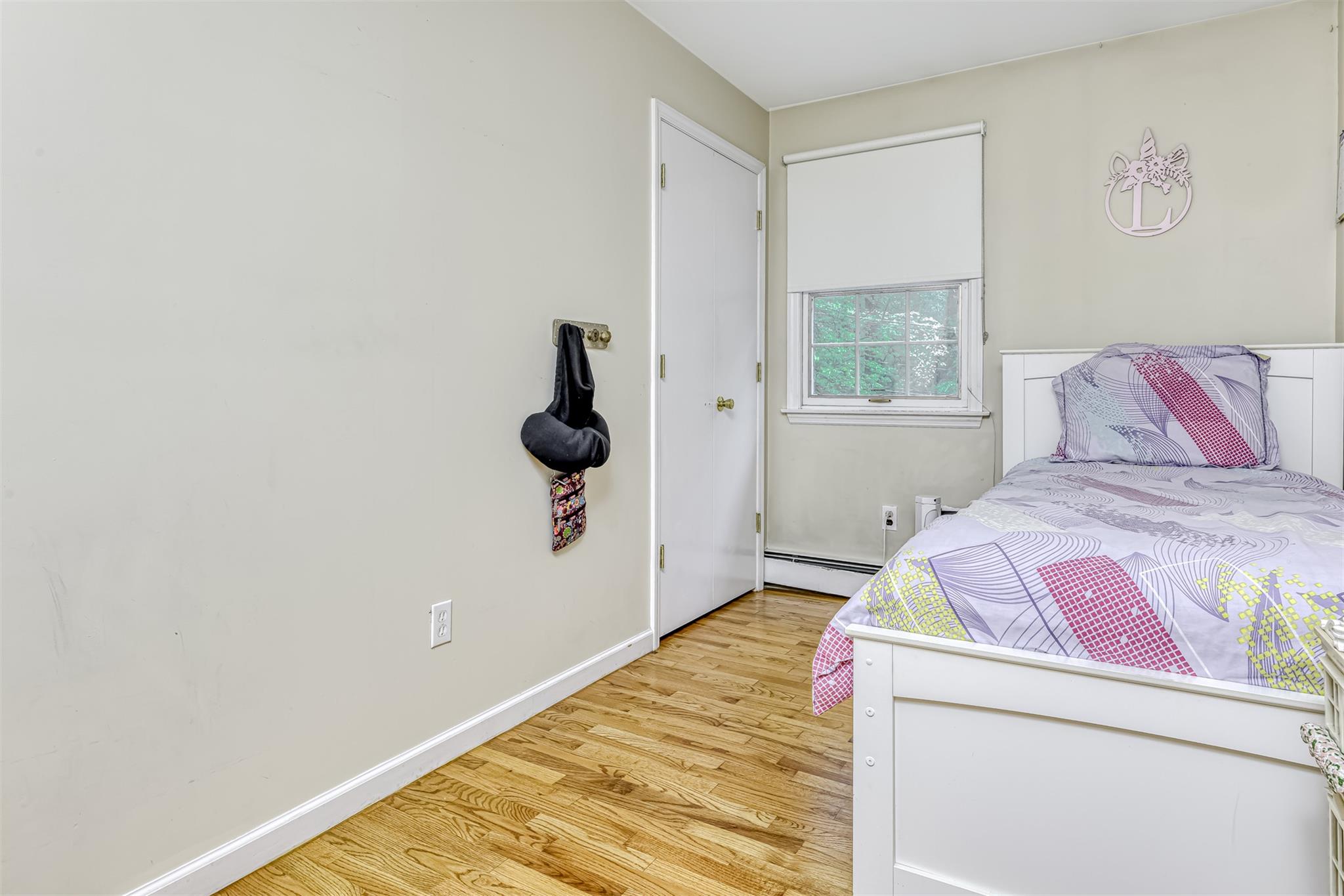 60 Highview Road Monsey, NY 10952 - Photo 18 of 26 a bedroom with a bed and a window