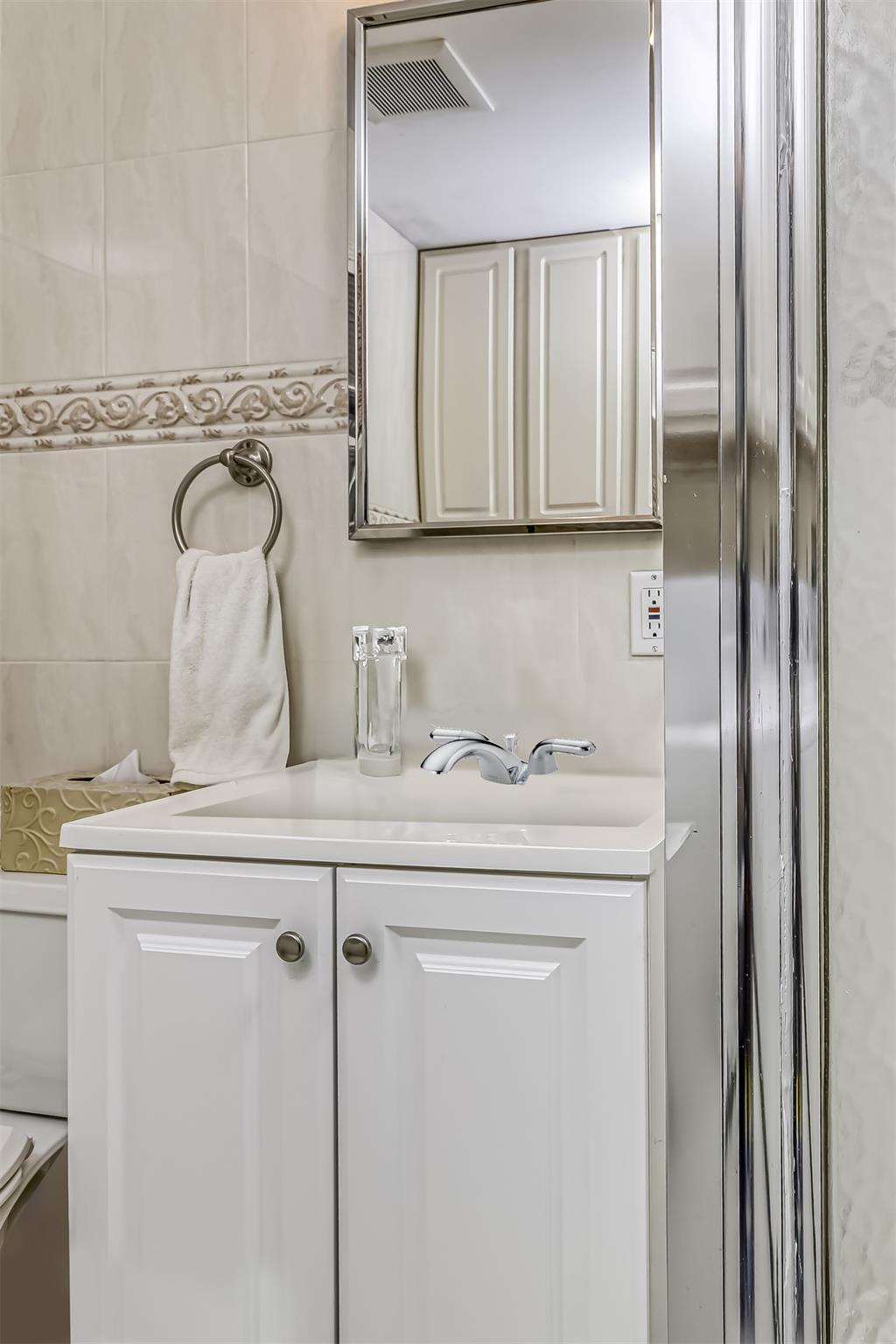 60 Highview Road Monsey, NY 10952 - Photo 22 of 26 a bathroom with a granite countertop sink and a mirror