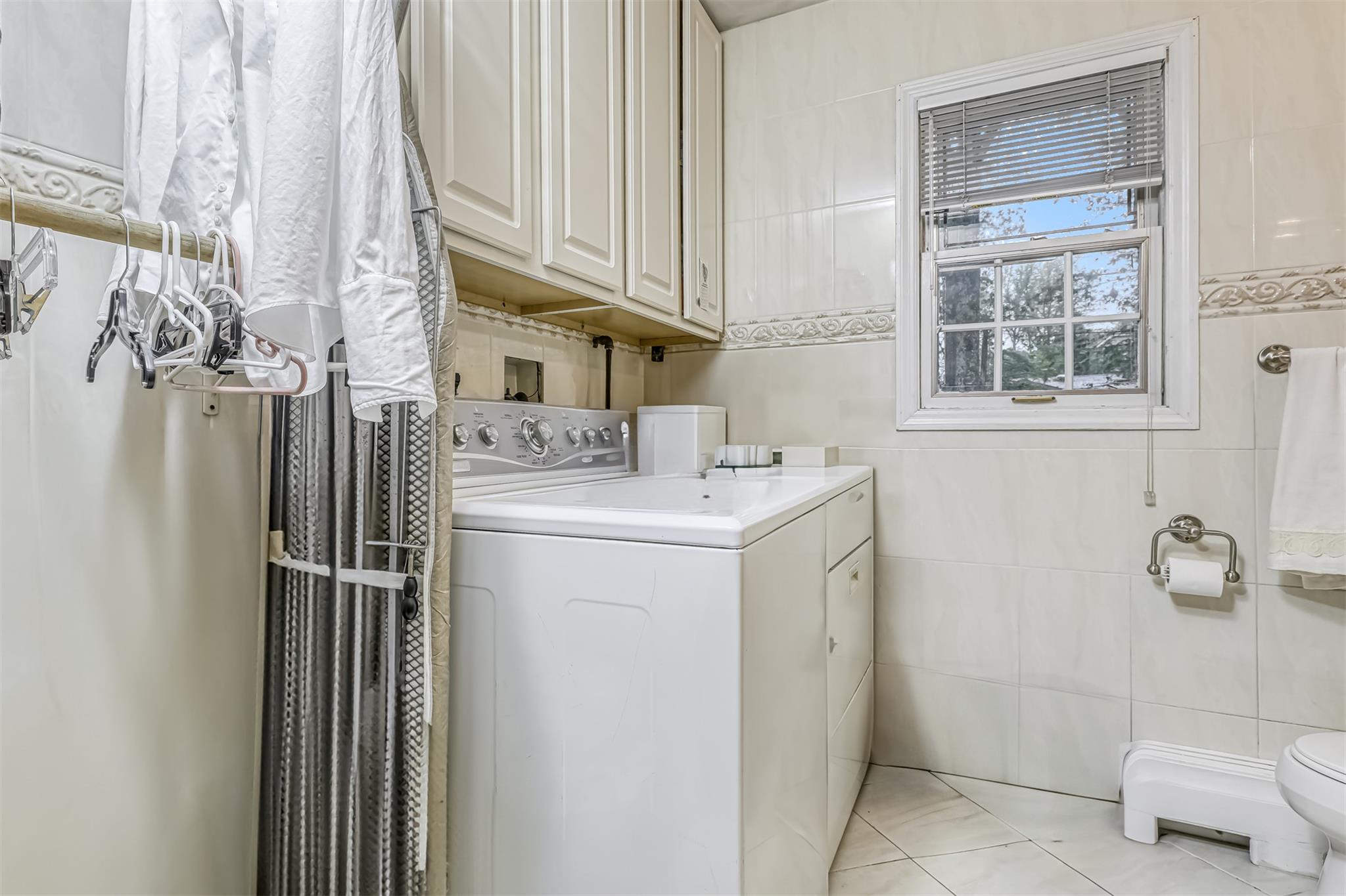 60 Highview Road Monsey, NY 10952 - Photo 23 of 26 a utility room with dryer and washer