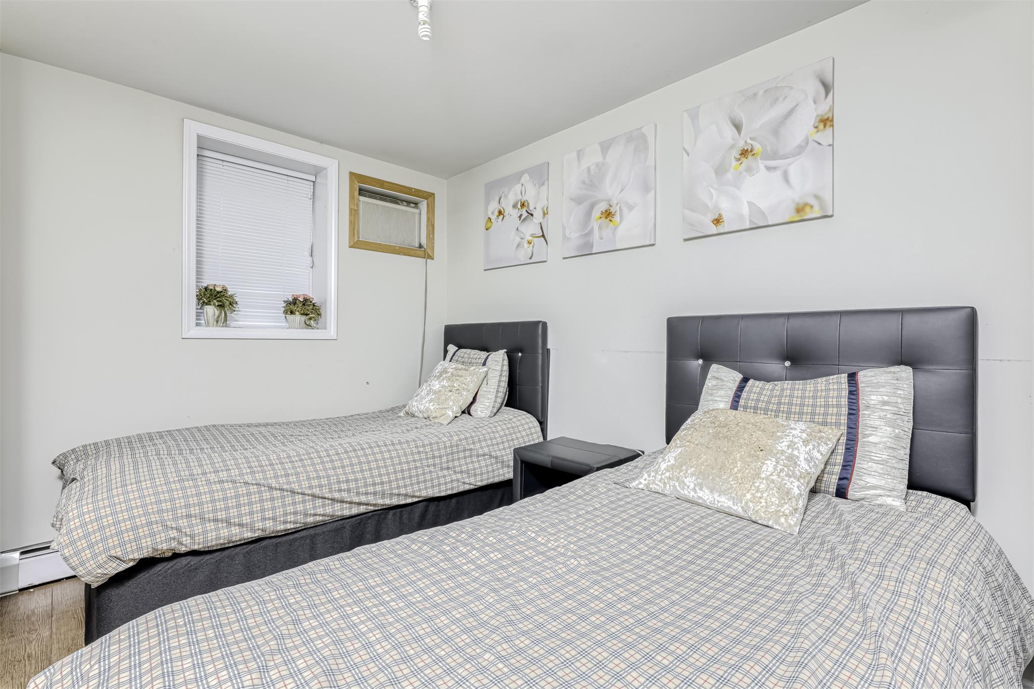 60 Highview Road Monsey, NY 10952 - Photo 24 of 26 a bedroom with two beds and painting on the wall