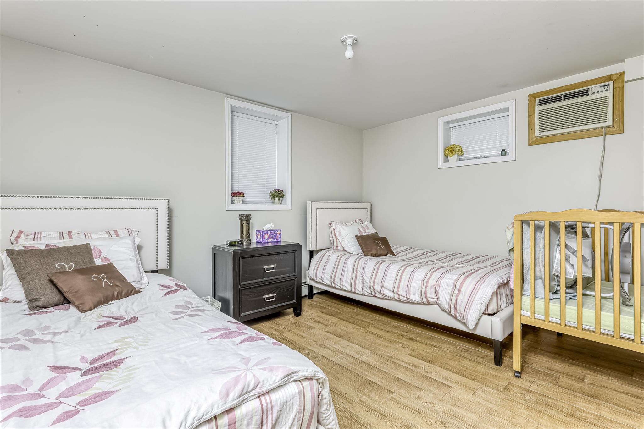 60 Highview Road Monsey, NY 10952 - Photo 25 of 26 a bedroom with a bed and wooden floor