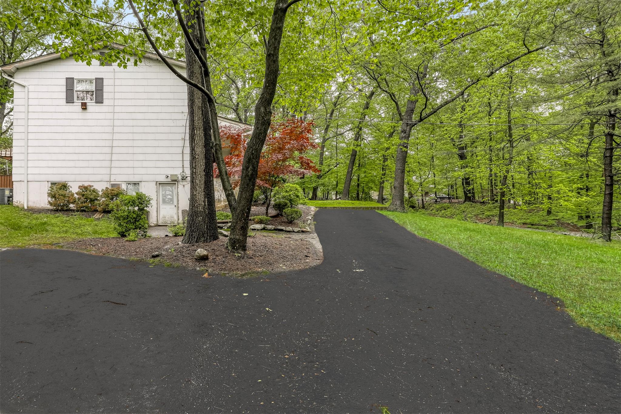 60 Highview Road Monsey, NY 10952 - Photo 3 of 26 a view of a street with a house in the background