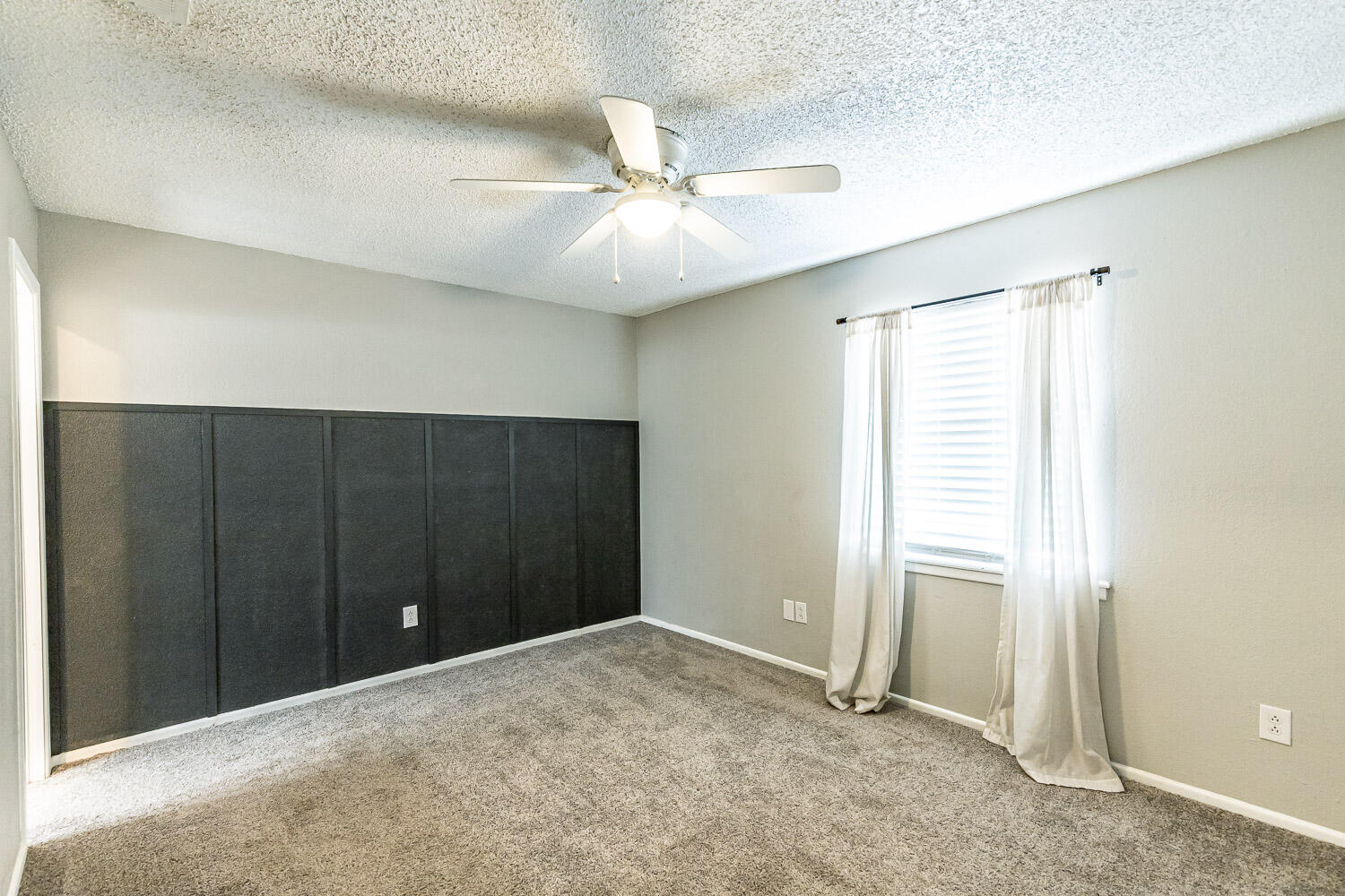 9611 Bangor Avenue Lubbock, TX 79424 - Photo 16 of 29 an empty room with closet and windows