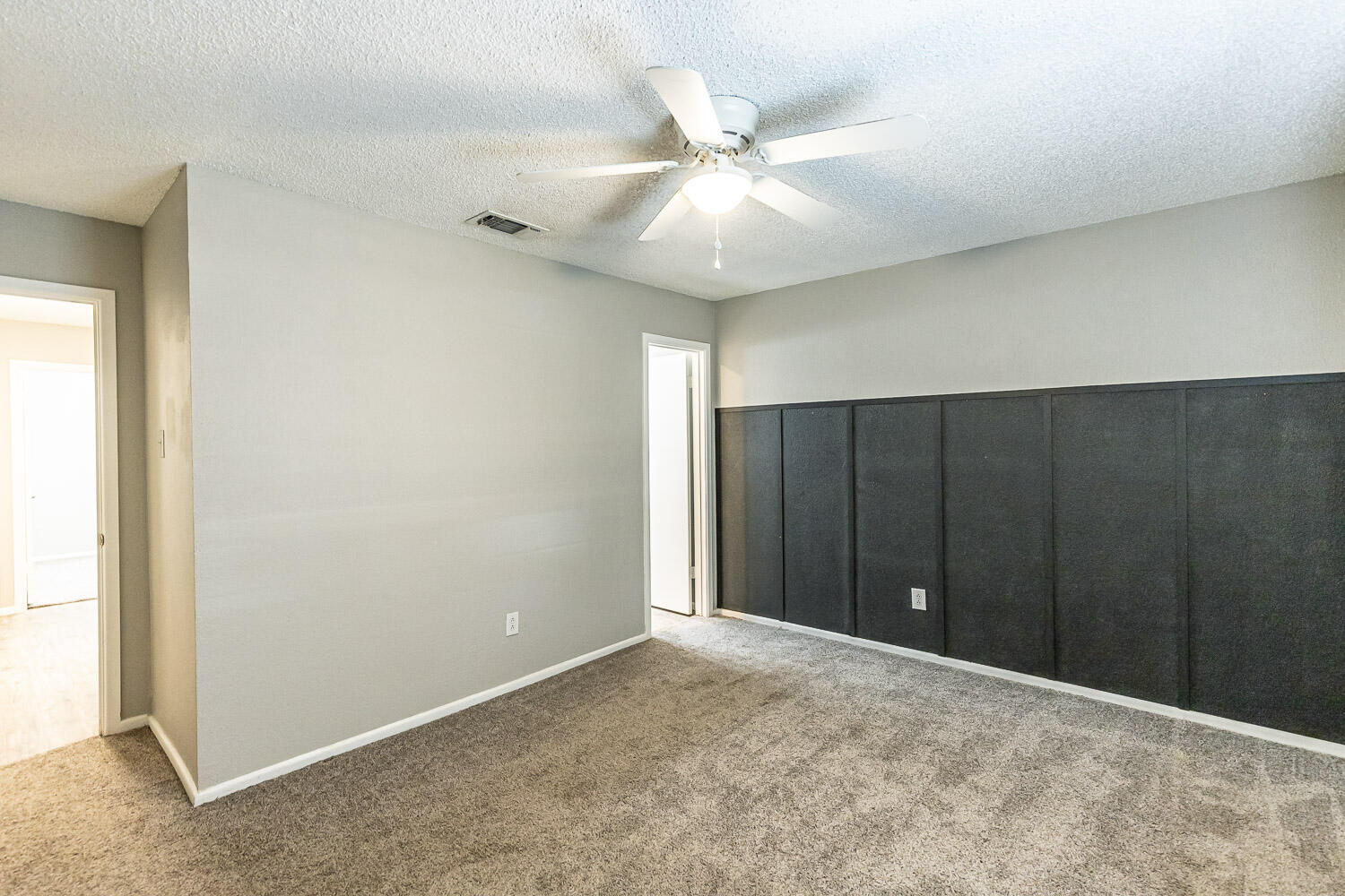 9611 Bangor Avenue Lubbock, TX 79424 - Photo 17 of 29 an empty room with closet and fan