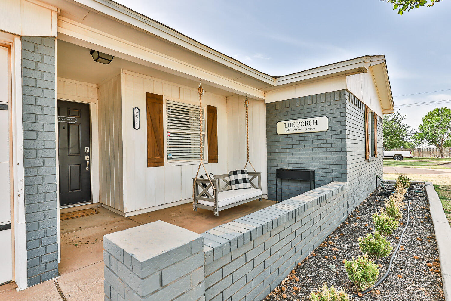 9611 Bangor Avenue Lubbock, TX 79424 - Photo 2 of 29 a front view of a house with outdoor seating
