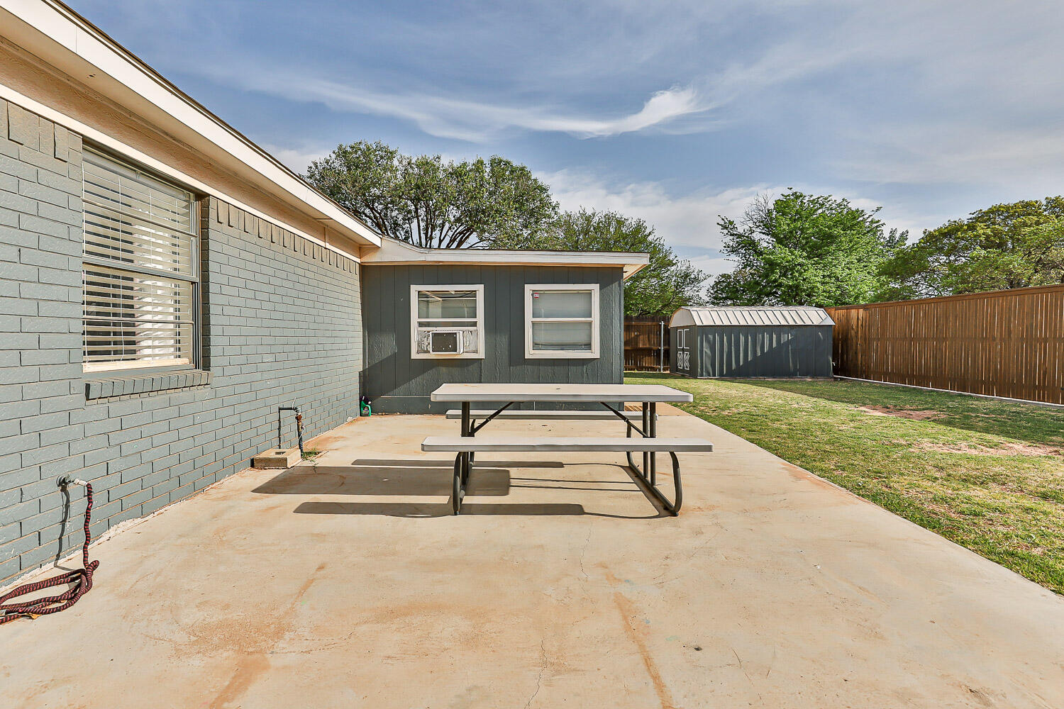 9611 Bangor Avenue Lubbock, TX 79424 - Photo 27 of 29 a house view with a outdoor space