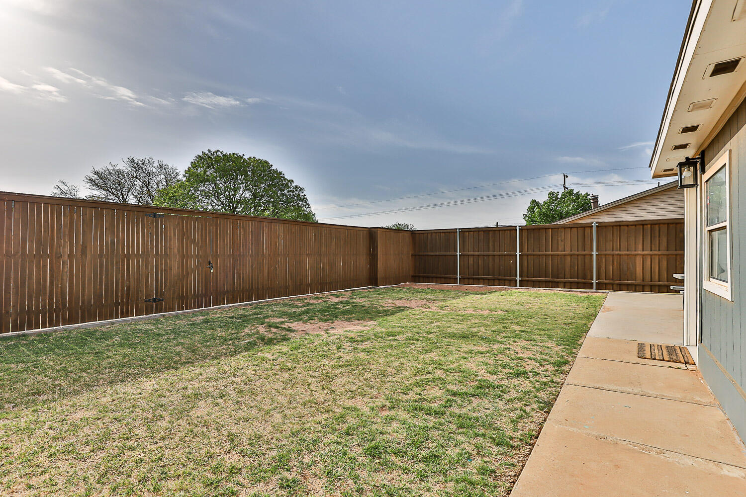 9611 Bangor Avenue Lubbock, TX 79424 - Photo 28 of 29 a view of backyard with green space