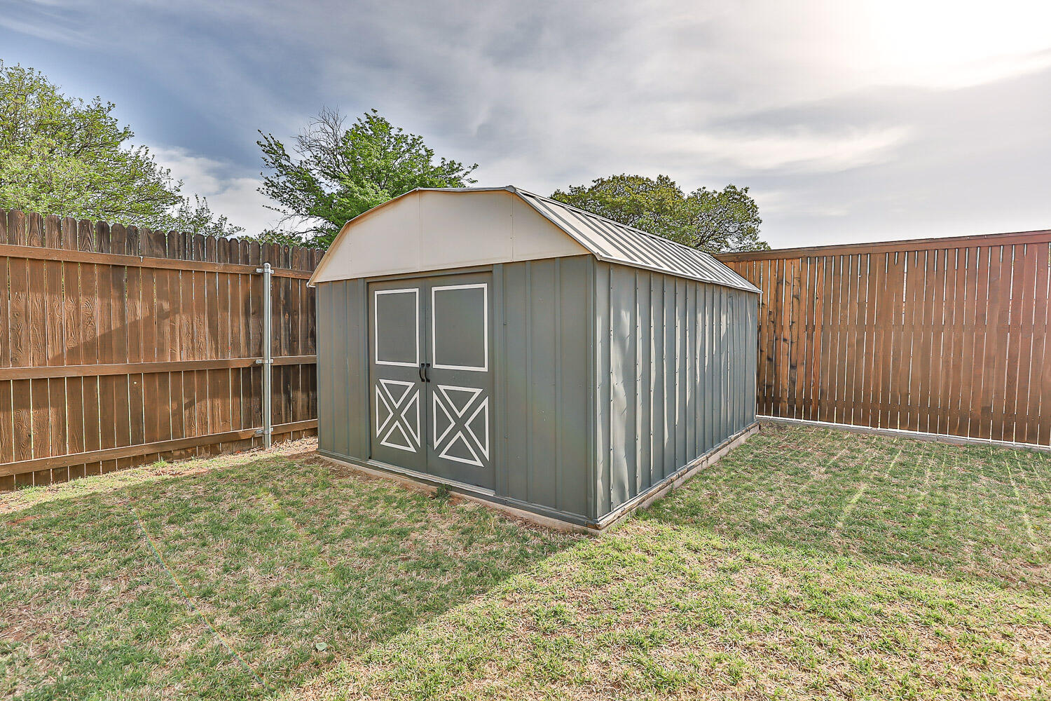 9611 Bangor Avenue Lubbock, TX 79424 - Photo 29 of 29 a house view with a garden space