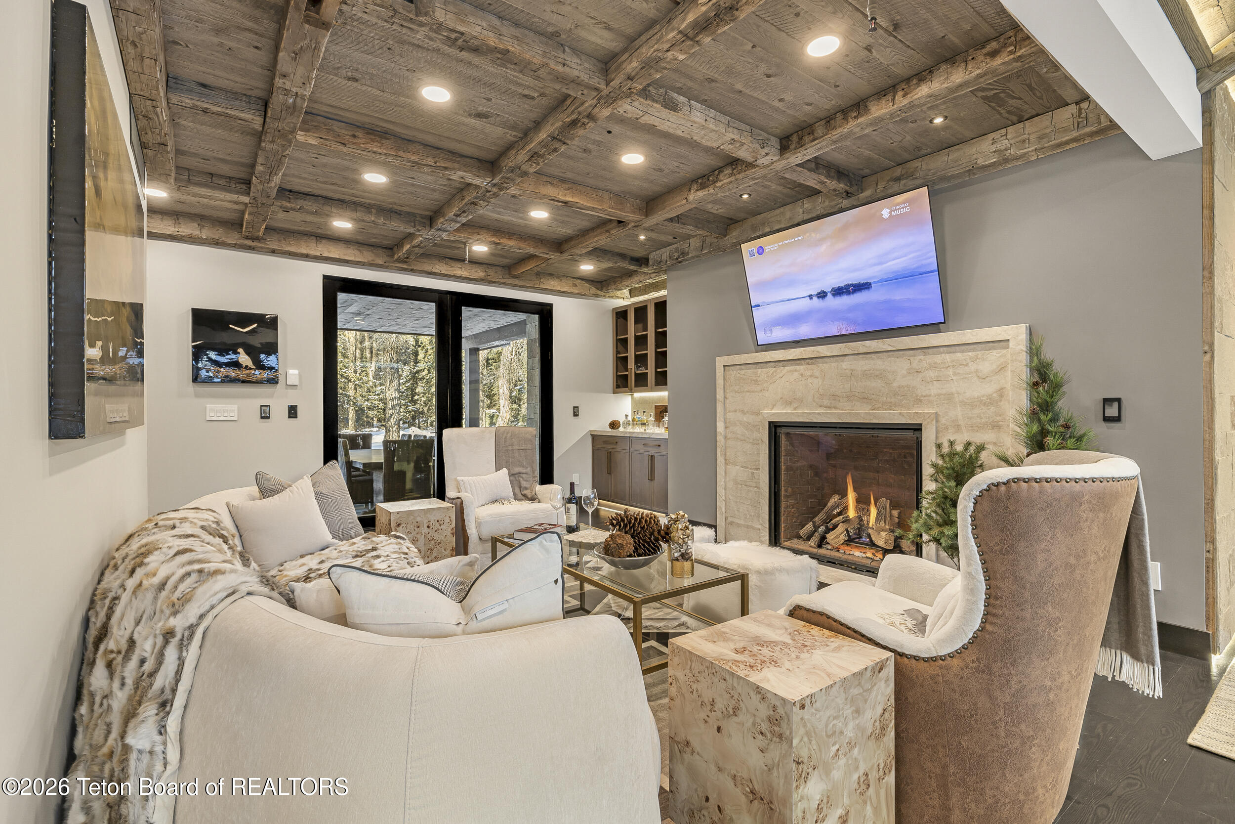 8910 Porter Loop Road Jackson, WY 83001 - Photo 24 of 79 Heathroom with Fireplace