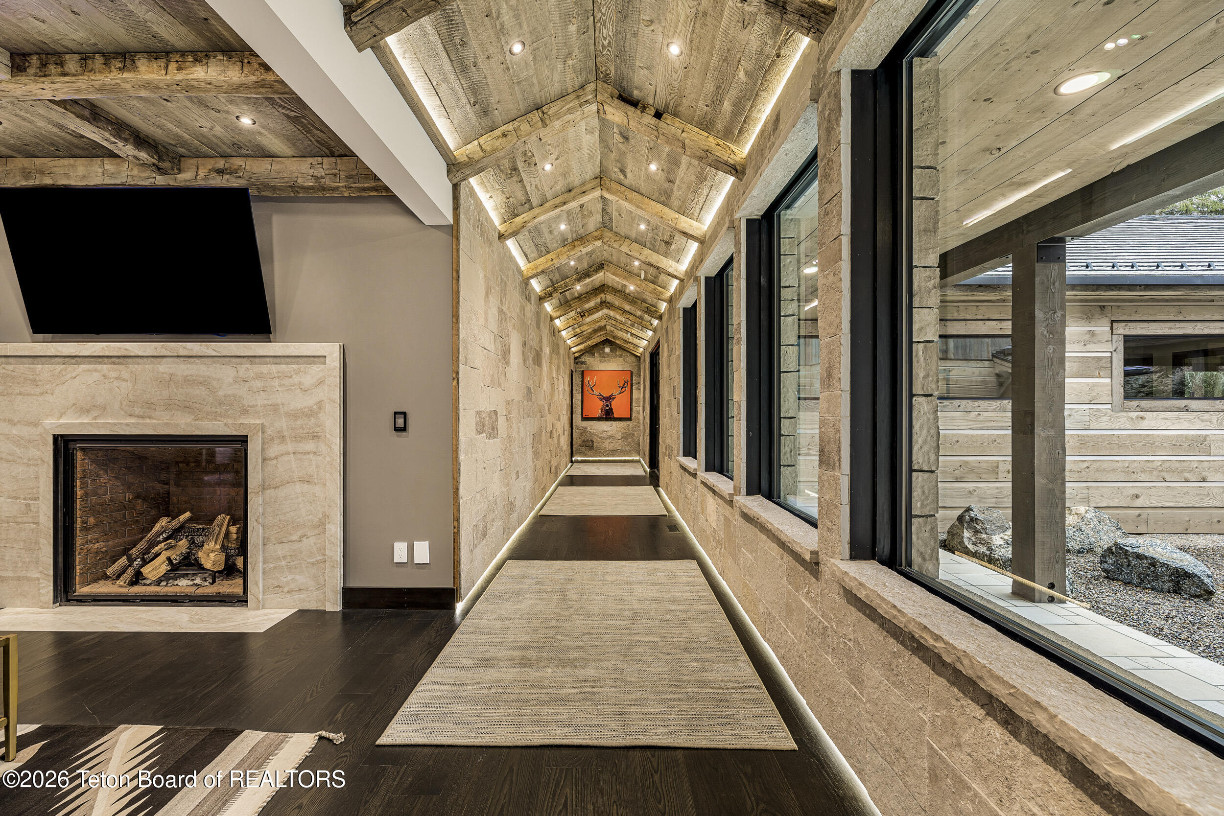 8910 Porter Loop Road Jackson, WY 83001 - Photo 28 of 79 Art Gallery/Hallway Stone and Reclaimed