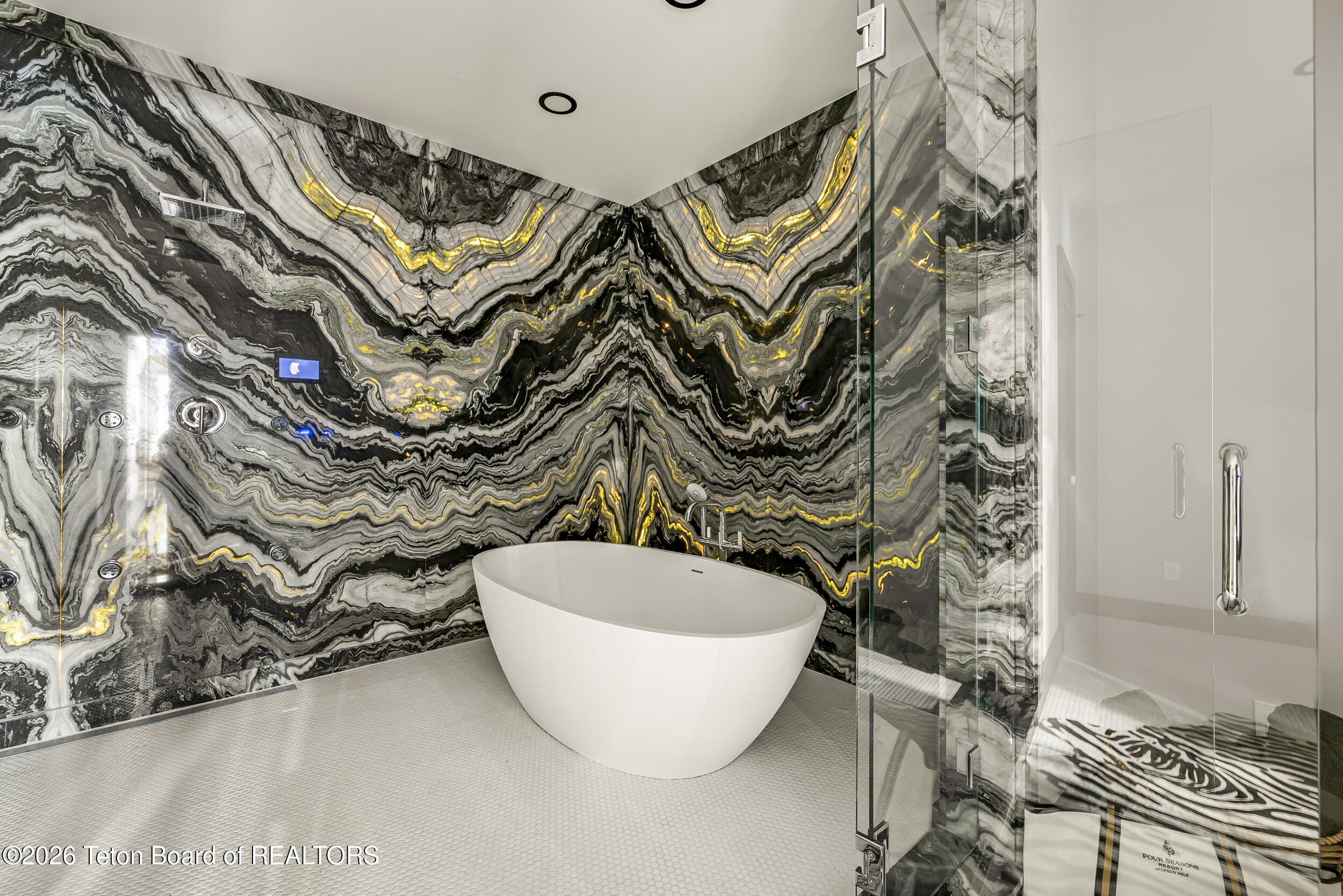 8910 Porter Loop Road Jackson, WY 83001 - Photo 36 of 79 Book Matched Slab Wet Room