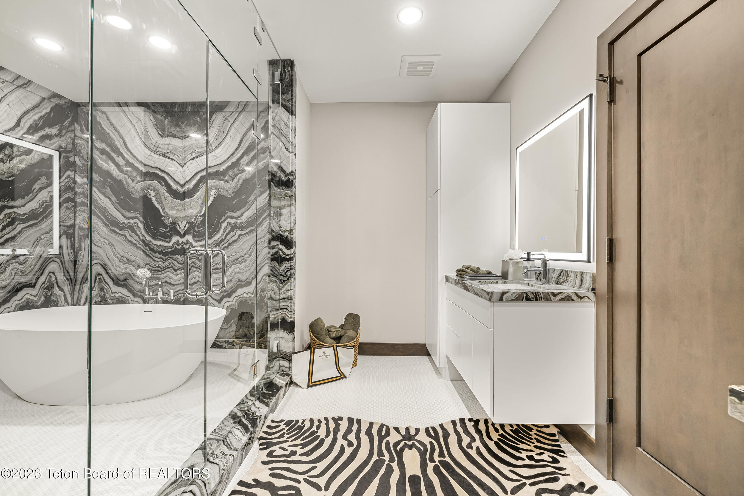 8910 Porter Loop Road Jackson, WY 83001 - Photo 37 of 79 Primary Suite