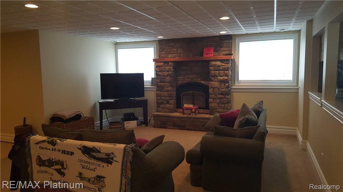 522 Timbermill Lane Howell, MI 48843 - Photo 26 of 29 Lower Level Living Room
