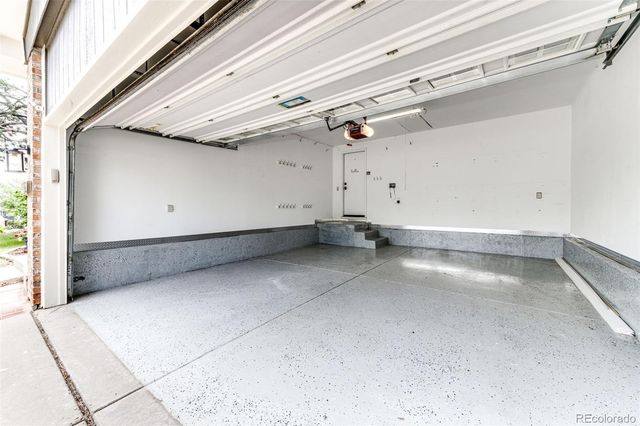 a view of a house with backyard porch and sitting area