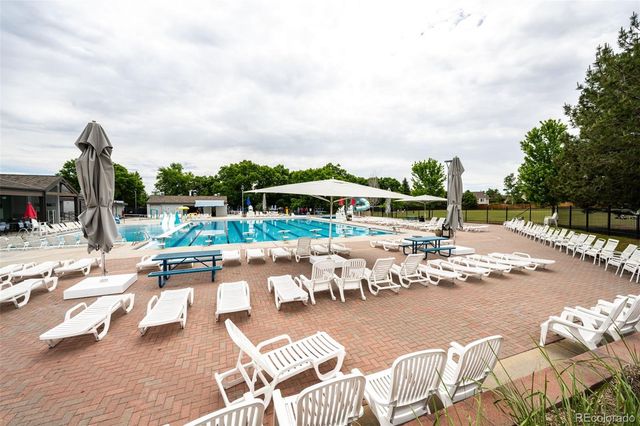 a view of outdoor space with sign board and garden