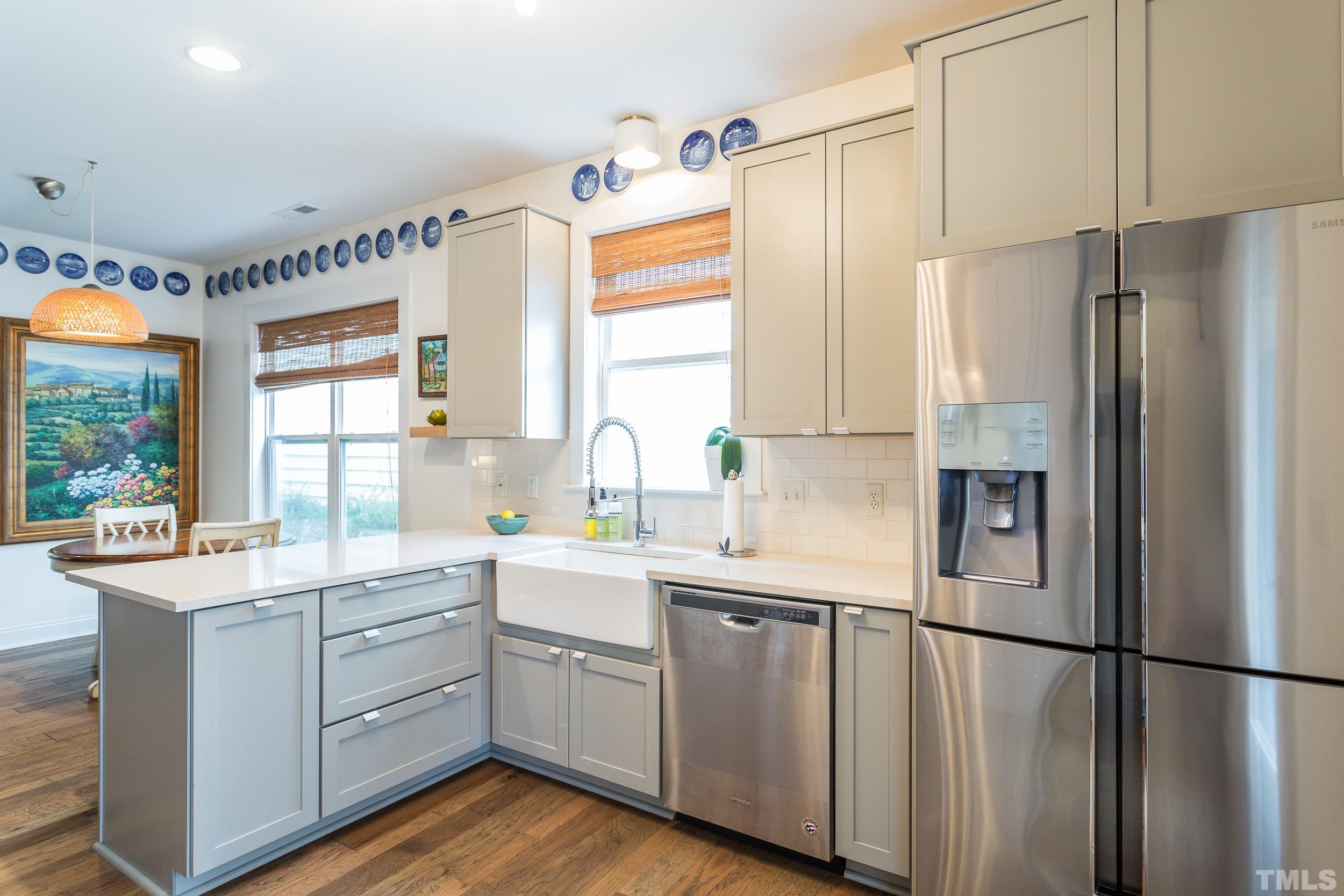 2116 Dunn Road Raleigh, NC 27614 - Photo 11 of 26 a kitchen with a sink a refrigerator and window