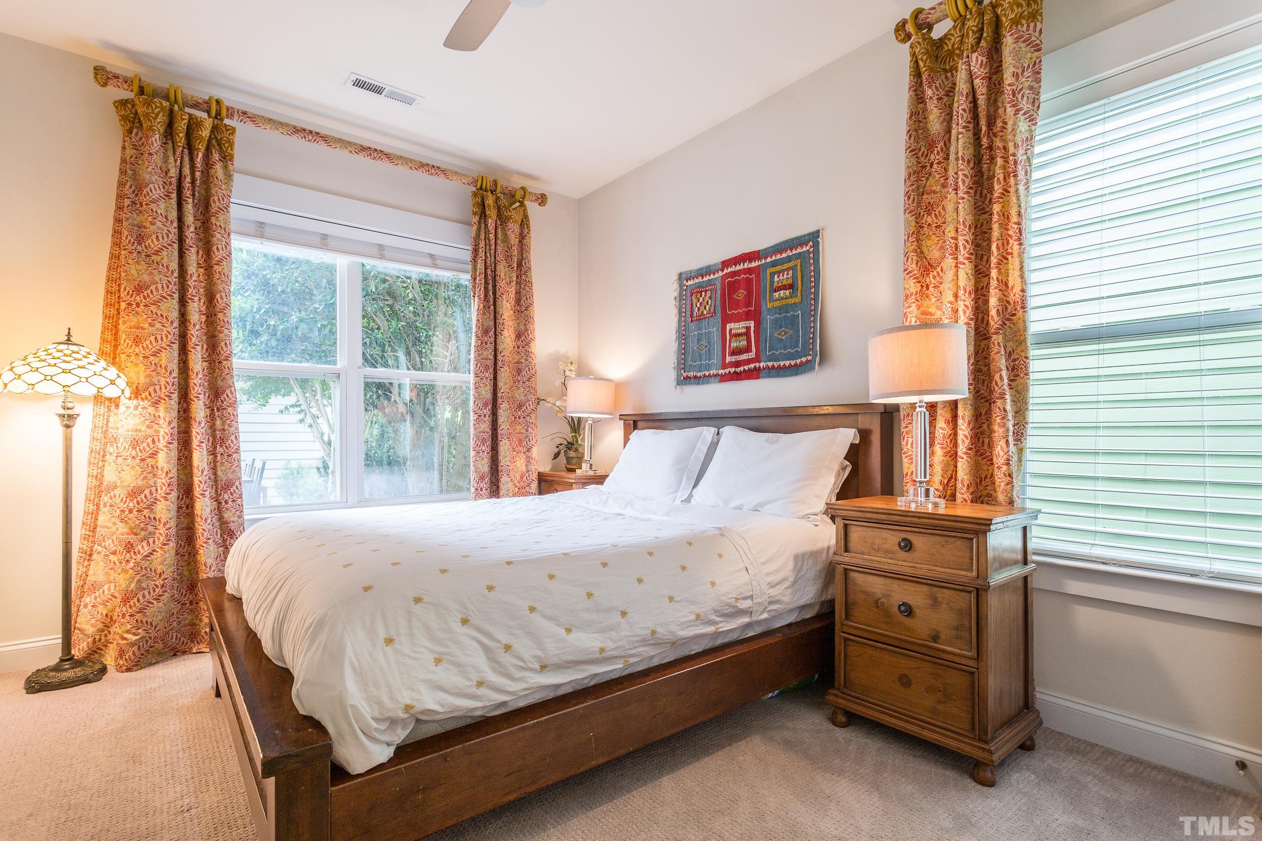 2116 Dunn Road Raleigh, NC 27614 - Photo 20 of 26 a bedroom with a bed and a window