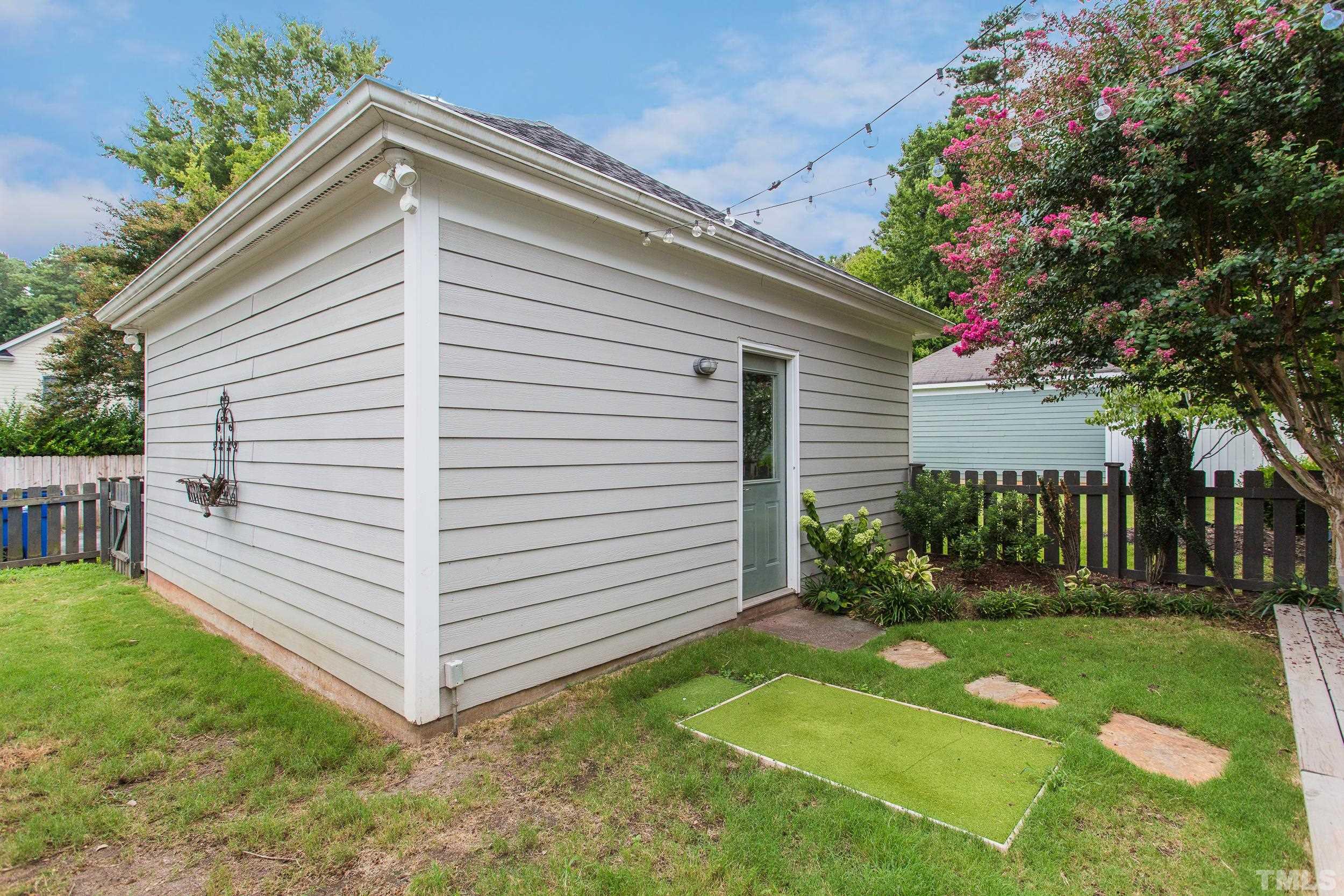 2116 Dunn Road Raleigh, NC 27614 - Photo 26 of 26 a front view of a house with garden