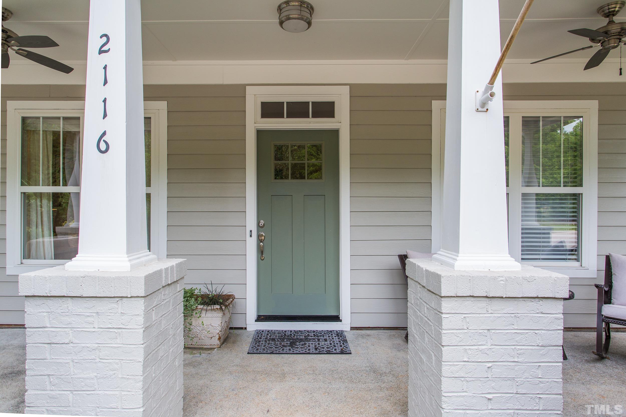 2116 Dunn Road Raleigh, NC 27614 - Photo 4 of 26 a front view of a house with a yard