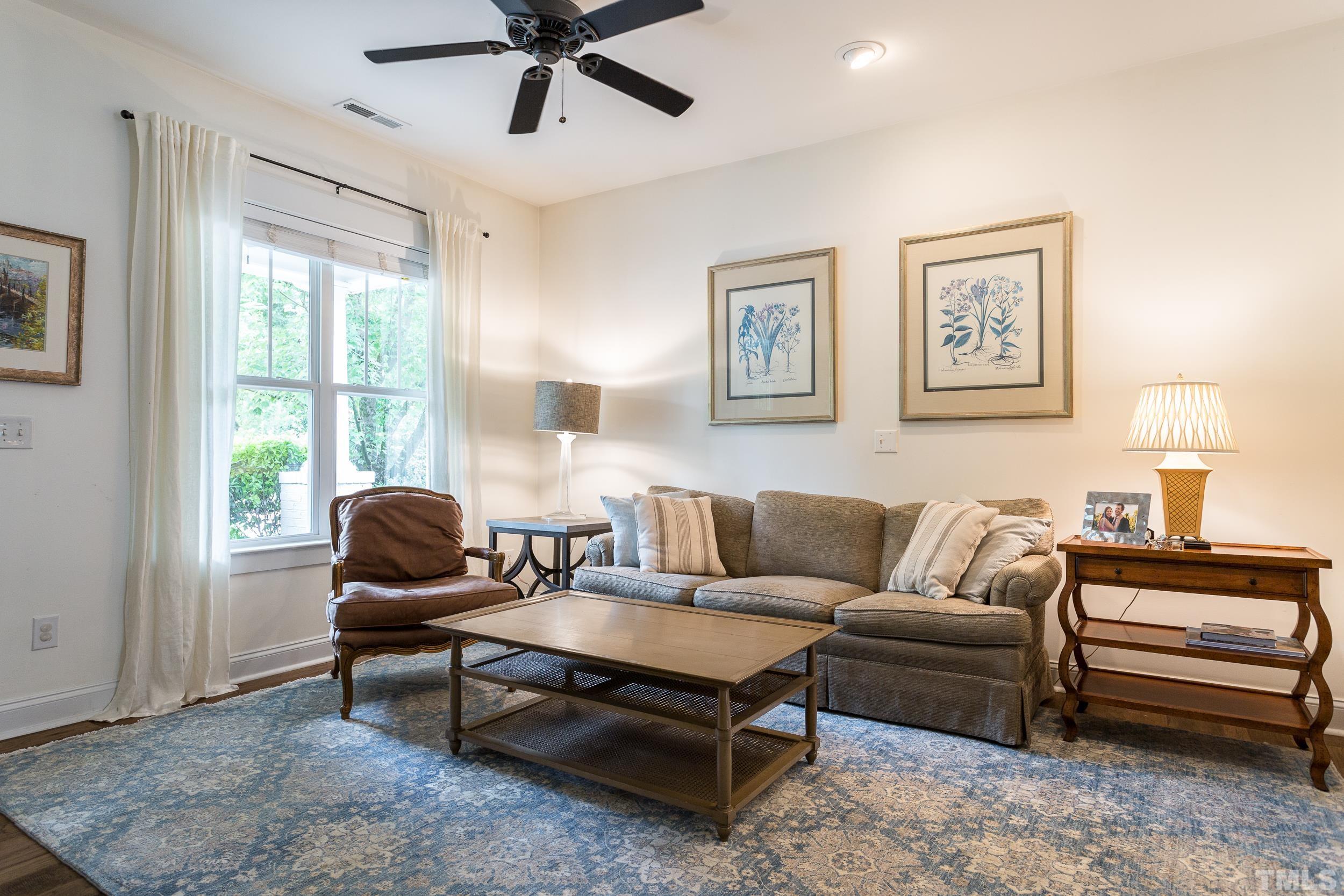 2116 Dunn Road Raleigh, NC 27614 - Photo 5 of 26 a living room with furniture and a window