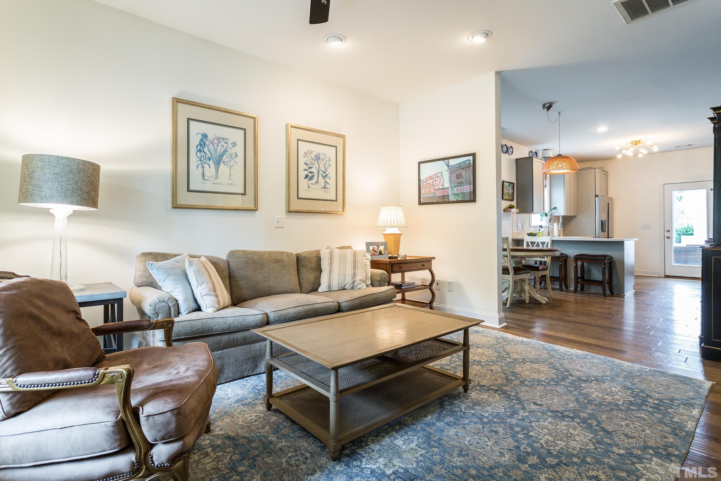 2116 Dunn Road Raleigh, NC 27614 - Photo 7 of 26 a living room with furniture and wooden floor