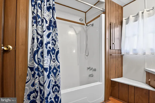 a sign board on the side of a road