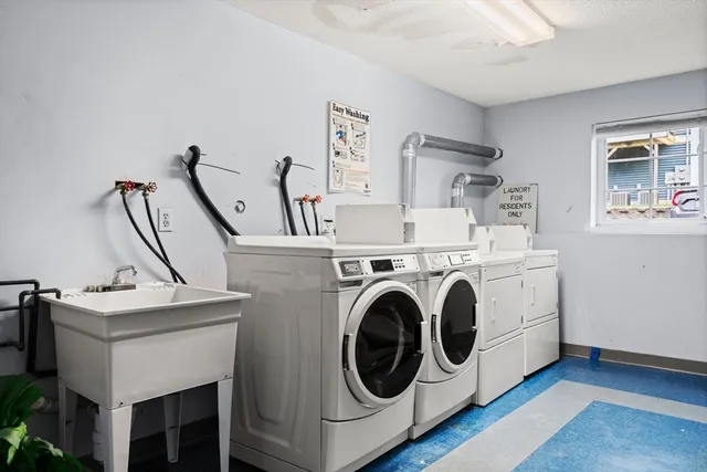 a view of a car park in front of a house