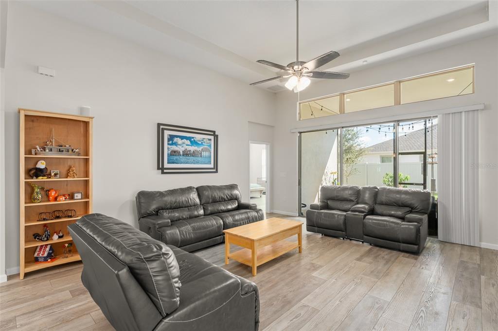 375 Dancing Water Drive Winter Springs, FL 32708 - Photo 17 of 73 a living room with furniture and a large window