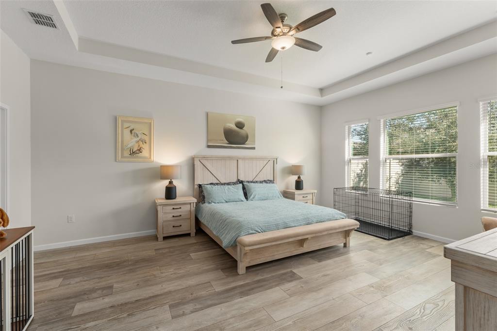 375 Dancing Water Drive Winter Springs, FL 32708 - Photo 21 of 73 a bedroom with a large bed and a window