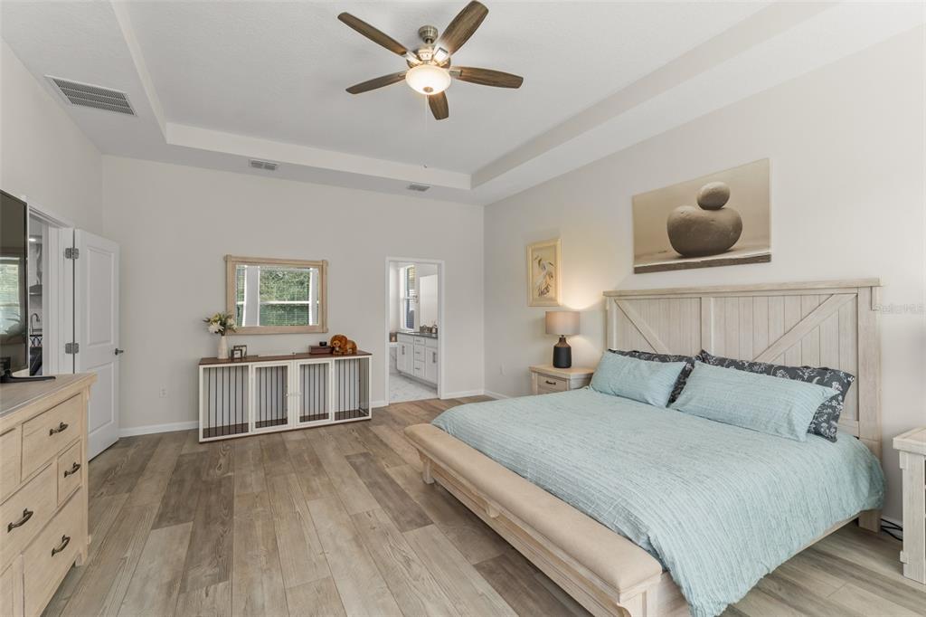 375 Dancing Water Drive Winter Springs, FL 32708 - Photo 22 of 73 a bedroom with a bed and a flat screen tv