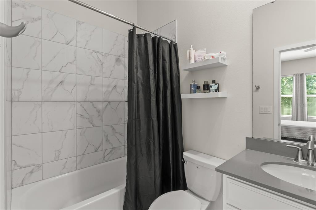 375 Dancing Water Drive Winter Springs, FL 32708 - Photo 31 of 73 a bathroom with a sink toilet and shower