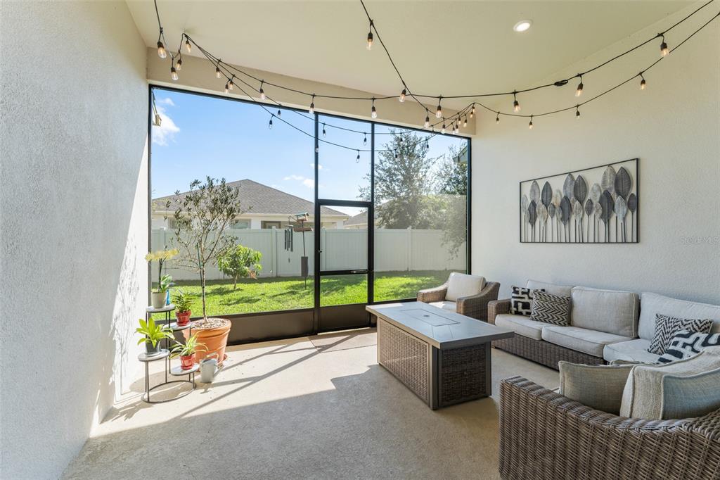 375 Dancing Water Drive Winter Springs, FL 32708 - Photo 43 of 73 a living room with furniture and a large window
