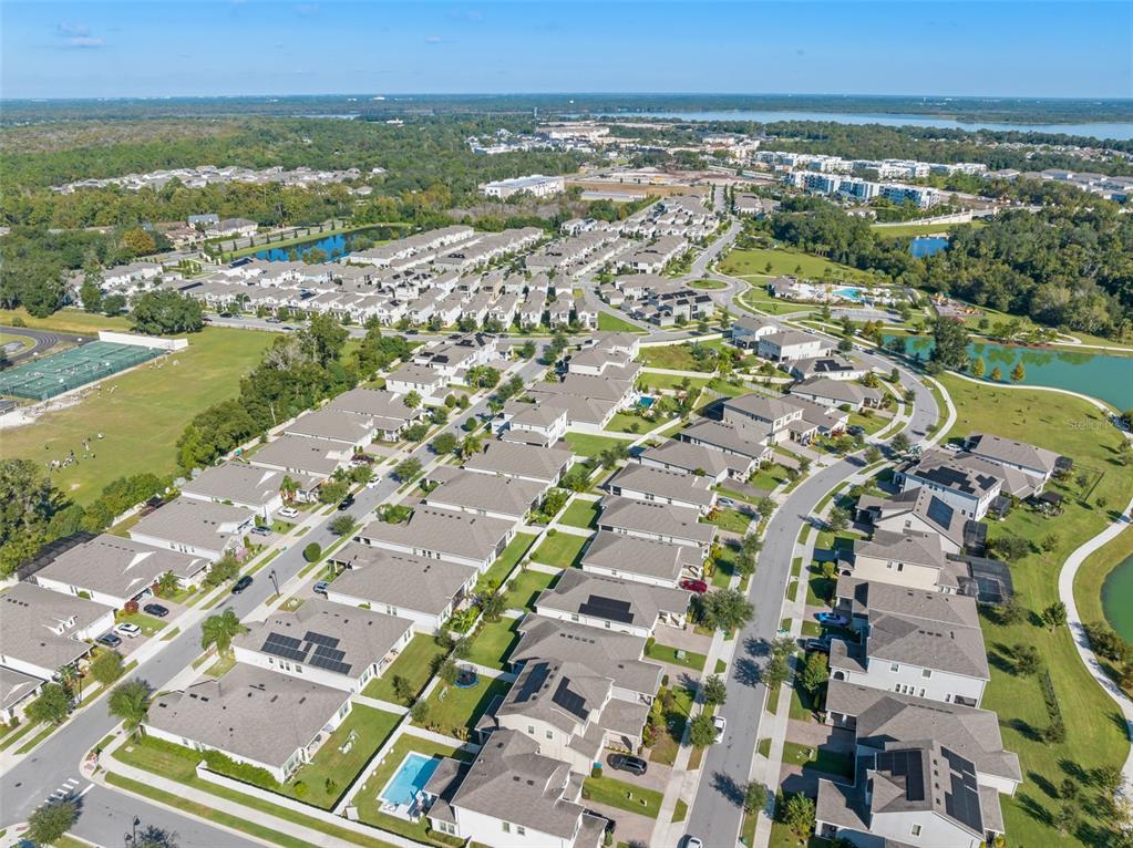 375 Dancing Water Drive Winter Springs, FL 32708 - Photo 66 of 73 an aerial view of residential houses with outdoor space