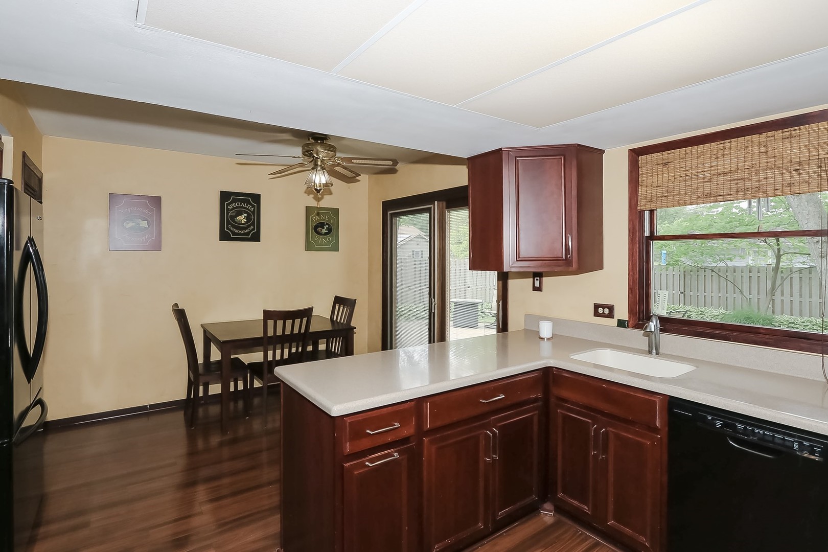 136 Weidner Road Buffalo Grove, IL 60089 - Photo 12 of 41 a kitchen with a sink cabinets and wooden floor
