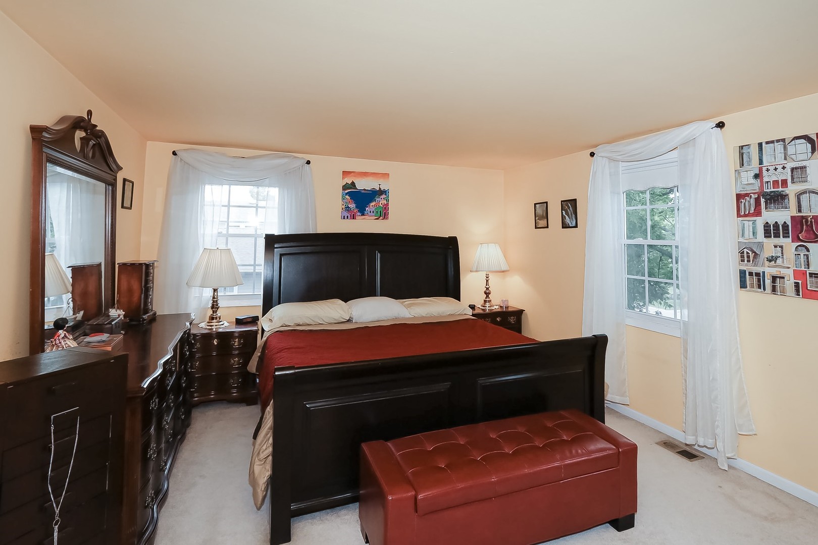 136 Weidner Road Buffalo Grove, IL 60089 - Photo 19 of 41 a bedroom with a bed window and a mirror