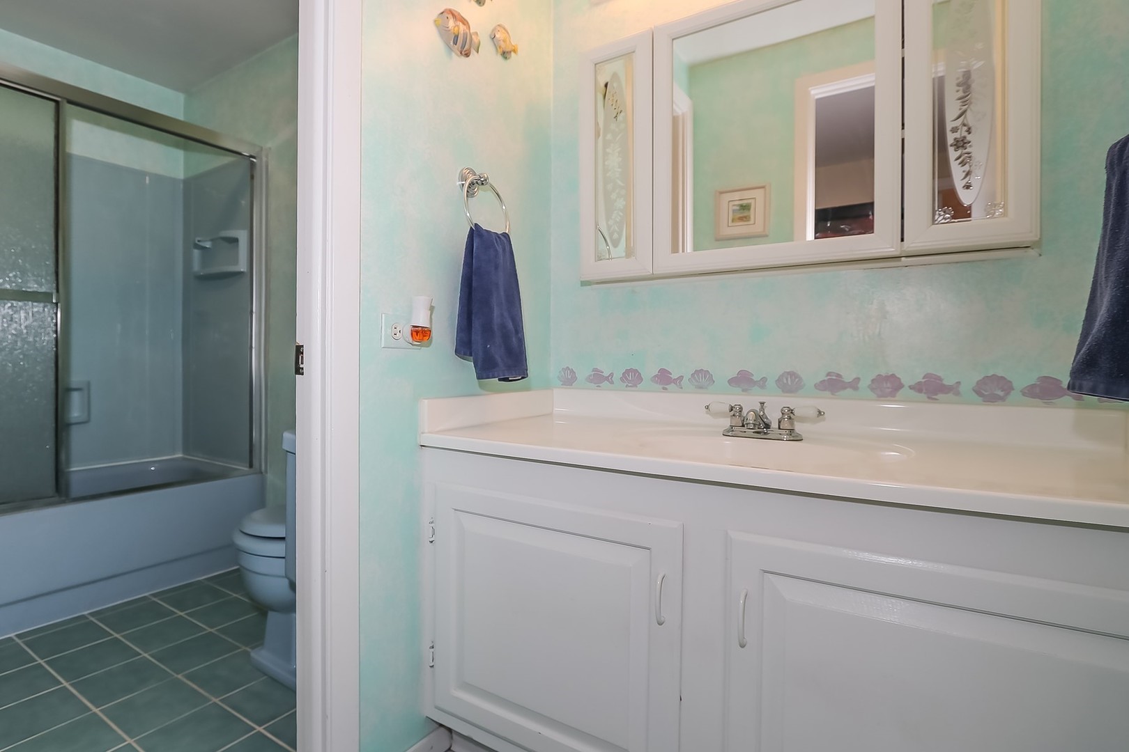 136 Weidner Road Buffalo Grove, IL 60089 - Photo 24 of 41 a bathroom with a sink and a mirror