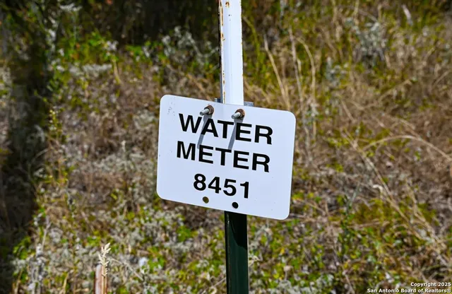 a sign broad on the side of the road