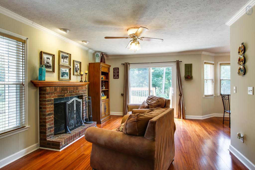 5909 Parham Road Franklin, TN 37064 - Photo 11 of 23 a living room with furniture and a fireplace