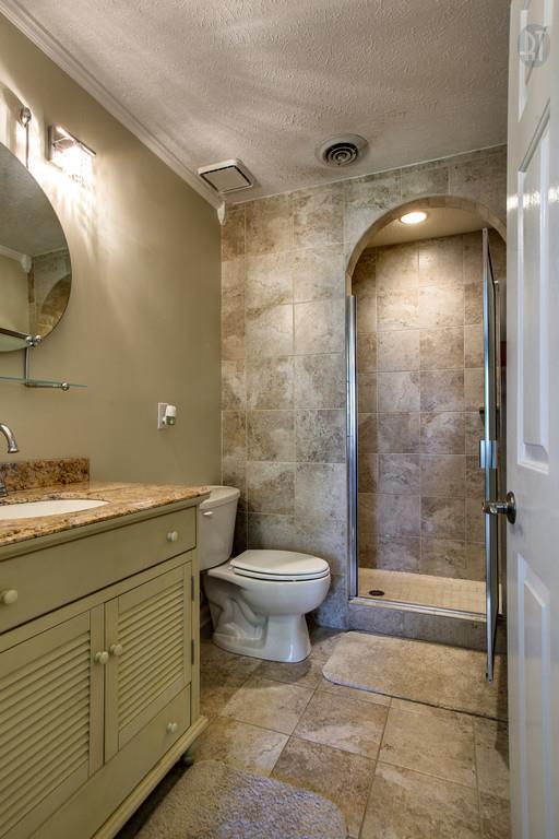 5909 Parham Road Franklin, TN 37064 - Photo 14 of 23 a bathroom with a toilet sink and shower