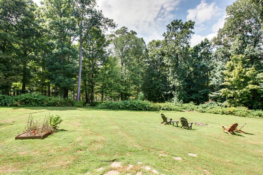 5909 Parham Road Franklin, TN 37064 - Photo 20 of 23 a view of a swimming pool with a yard