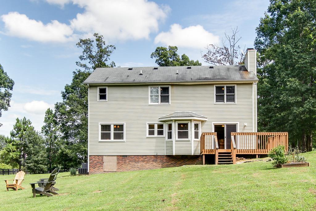 5909 Parham Road Franklin, TN 37064 - Photo 22 of 23 a front view of a house with a yard