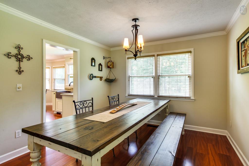 5909 Parham Road Franklin, TN 37064 - Photo 5 of 23 a view of a dining room with furniture window and wooden floor