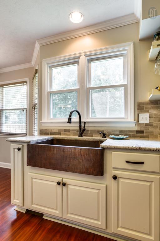 5909 Parham Road Franklin, TN 37064 - Photo 8 of 23 a kitchen with granite countertop white cabinets and a window
